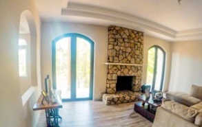 Grupo Videas living room with fireplace